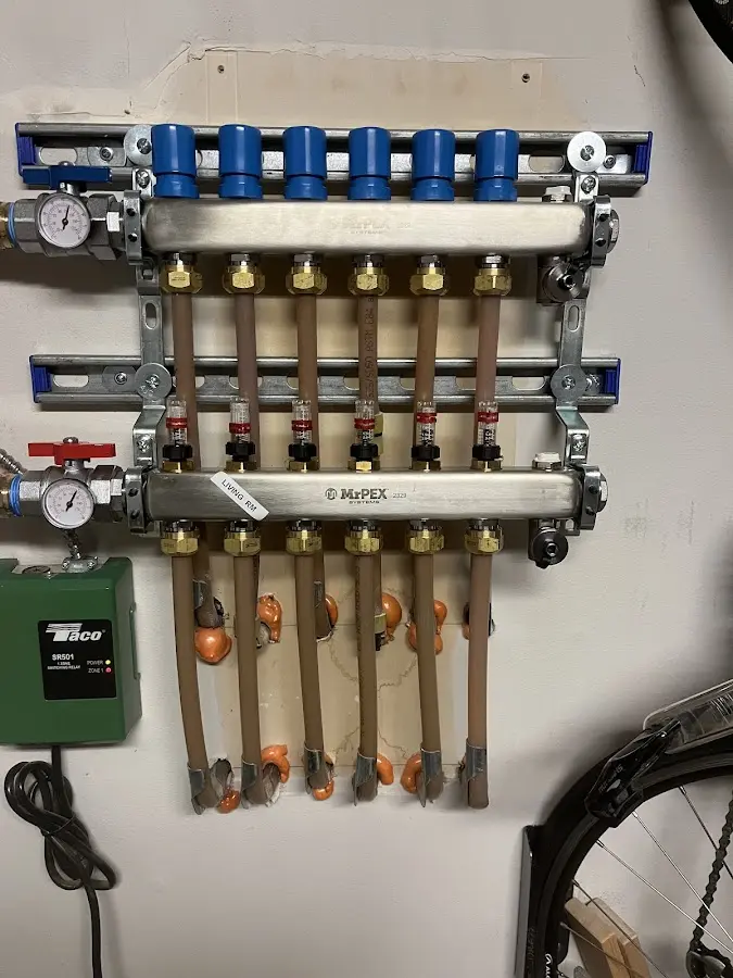 Plumber performing Water Heater Repair at a residential property in Mexico